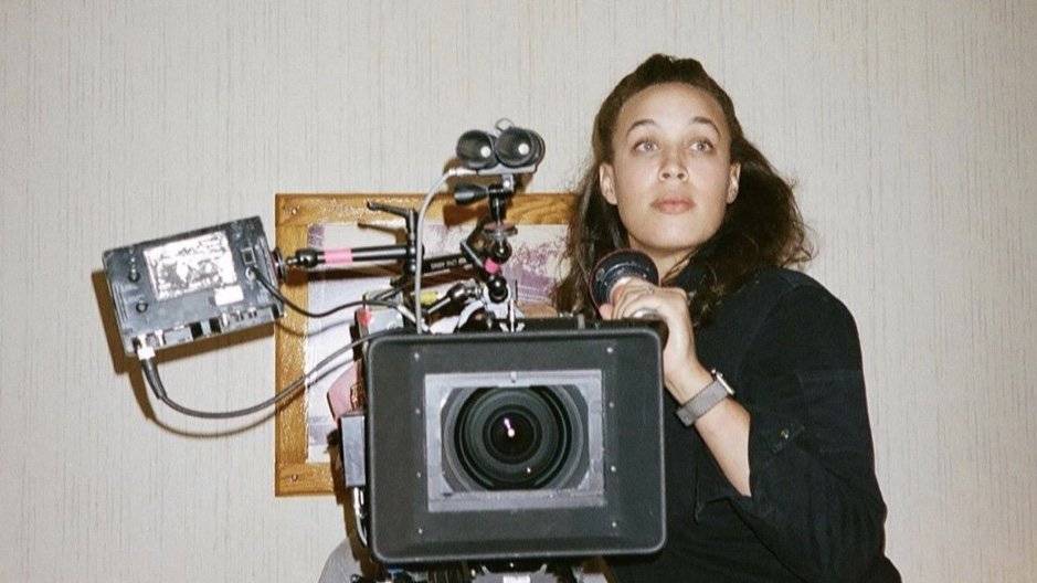 Cinematographer of Sorry, Baby - Mia Cioffi Henry, posing with vintage camera | from https://www.miacioffihenry.com/ 