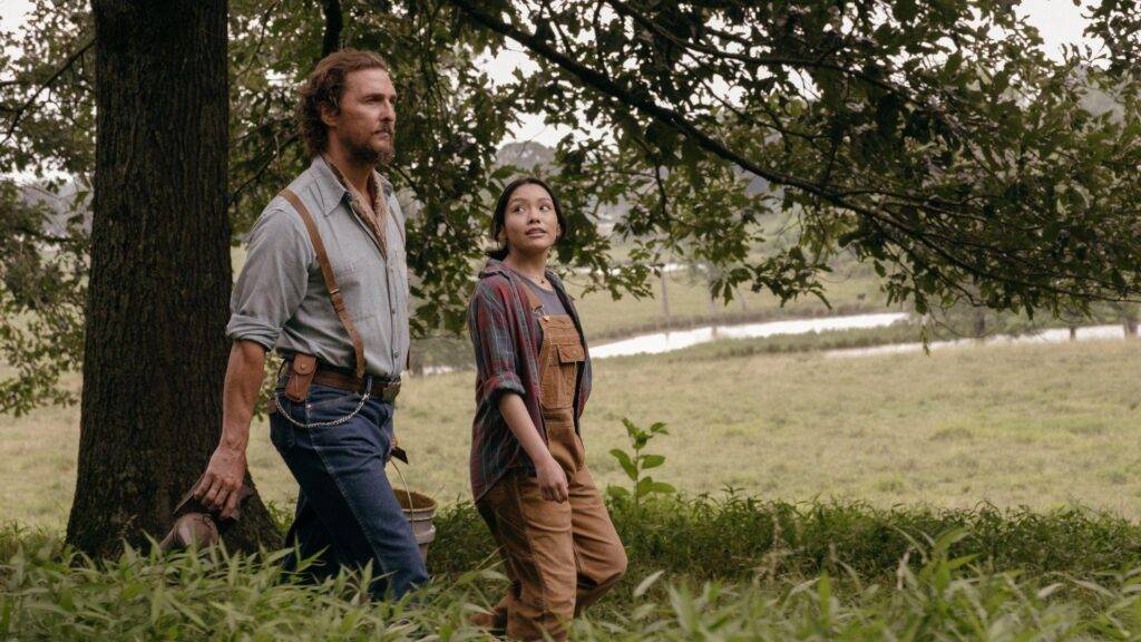 Matthew McConaughey and Angelina LookingGlass walking together in the movie The Rivals of Amziah King