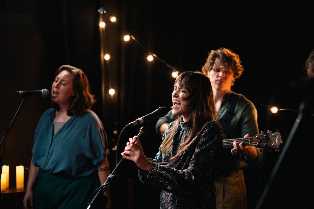 Cassidy Waring and her Band in a Promo Still for Hearse Chasing