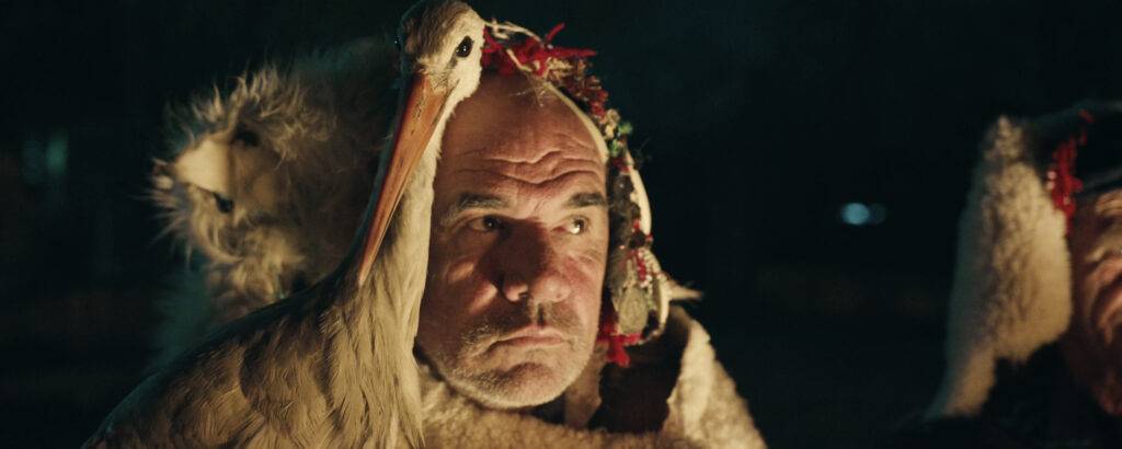 The Tale of Silyan Still - Nikola and Silyan by the fire as Nikola and his friends perform a traditional Macedonian ritual. (Credit: Ciconia Film/Jean Dakar)