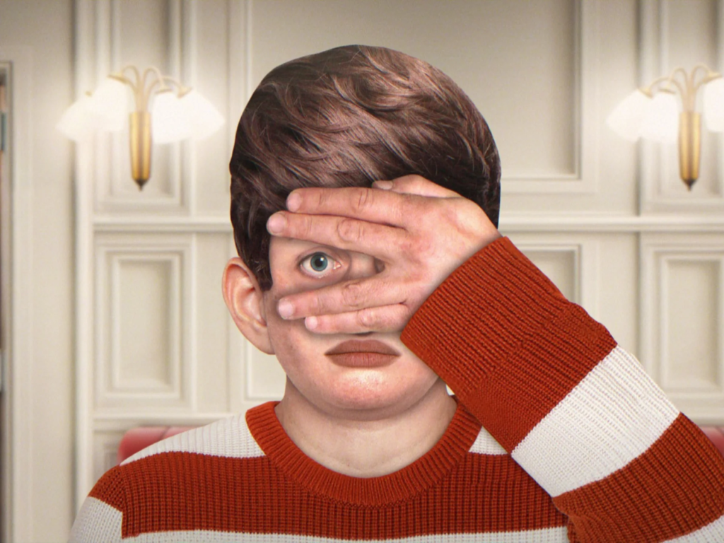 Animated character covering one eye with a hand in Blaise
